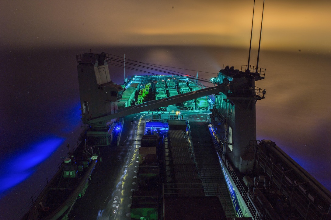 The USS Harpers Ferry prepares for flight operations at night in the Pacific Ocean, Dec. 7, 2015. U.S. Navy photo by Petty Officer 3rd Class Zachary Eshleman