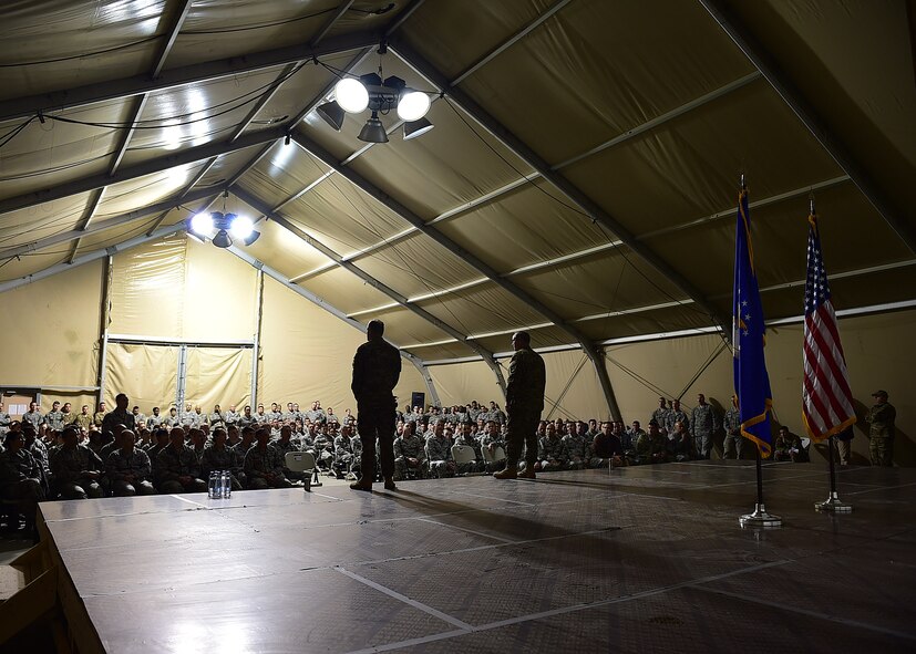 Air Force Chief of Staff Gen. Mark A Welsh III and Chief Master Sgt. of the Air Force James A. Cody address questions from Airmen currently deployed to the 332nd Air Expeditionary Wing at an undisclosed location in Southwest Asia, Dec. 10, 2015. Welsh and Cody visited the base to express their gratitude and thanks for the hard work, dedication and sacrifices made in support of Operation INHERENT RESOLVE. (U.S. Air Force photo by Staff Sgt. Jerilyn Quintanilla)