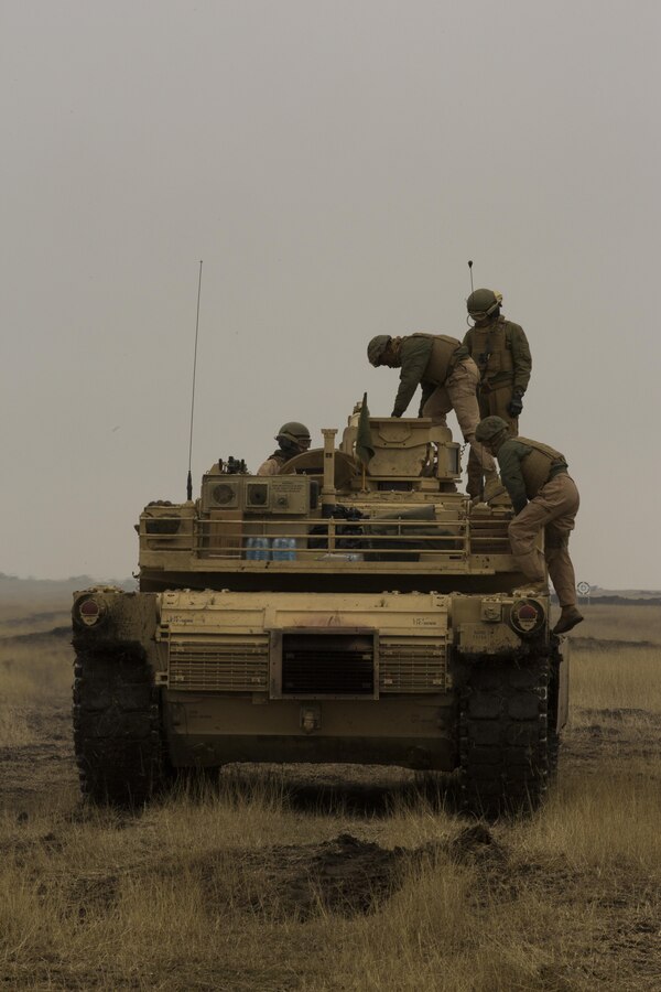 U.S. Marines with Combined Arms Company, Black Sea Rotational Force, conduct a tank shoot rehearsal during Platinum Lynx 16-2 at Smardan Training Area, Romania, Dec. 9, 2015. Exercise Platinum Lynx 16-2 is a NATO-led multinational exercise designed to strengthen combat readiness, increase improve collective capabilities, and maintain proven relationships with allied and partner nations. (U.S. Marine Corps photo by Lance Cpl. Melanye E. Martinez/Released)