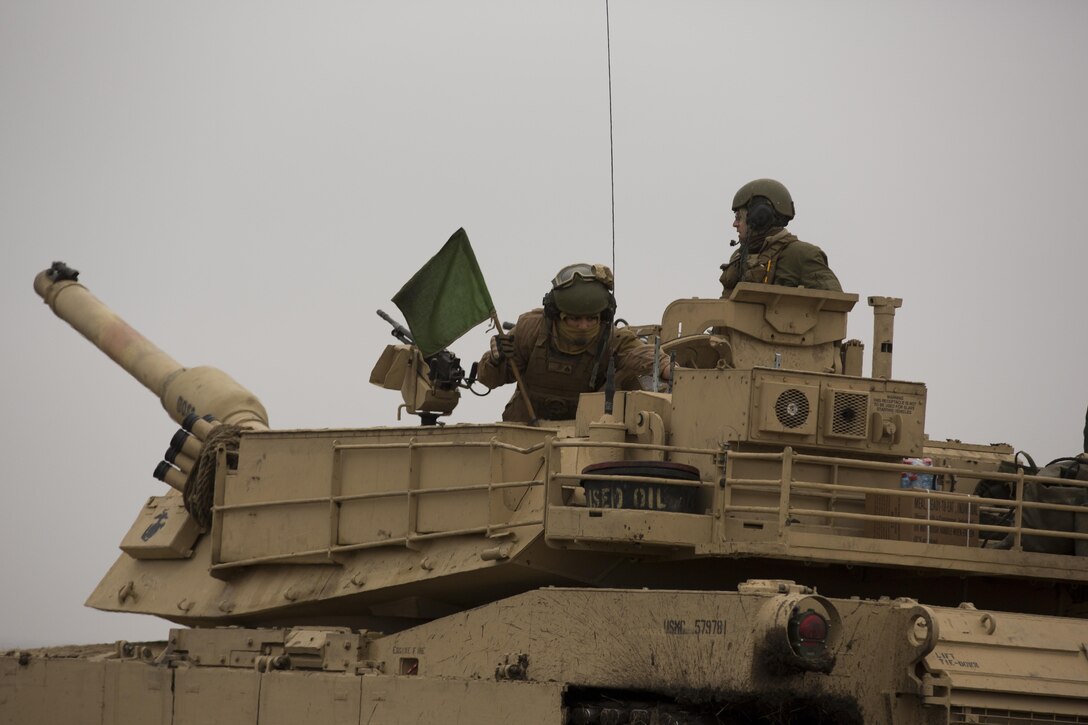 U.S. Marines with Combined Arms Company, Black Sea Rotational Force, conduct a tank shoot rehearsal during Platinum Lynx 16-2 at Smardan Training Area, Romania, Dec. 9, 2015. Exercise Platinum Lynx 16-2 is a NATO-led multinational exercise designed to strengthen combat readiness, increase improve collective capabilities, and maintain proven relationships with allied and partner nations. (U.S. Marine Corps photo by Lance Cpl. Melanye E. Martinez/Released)