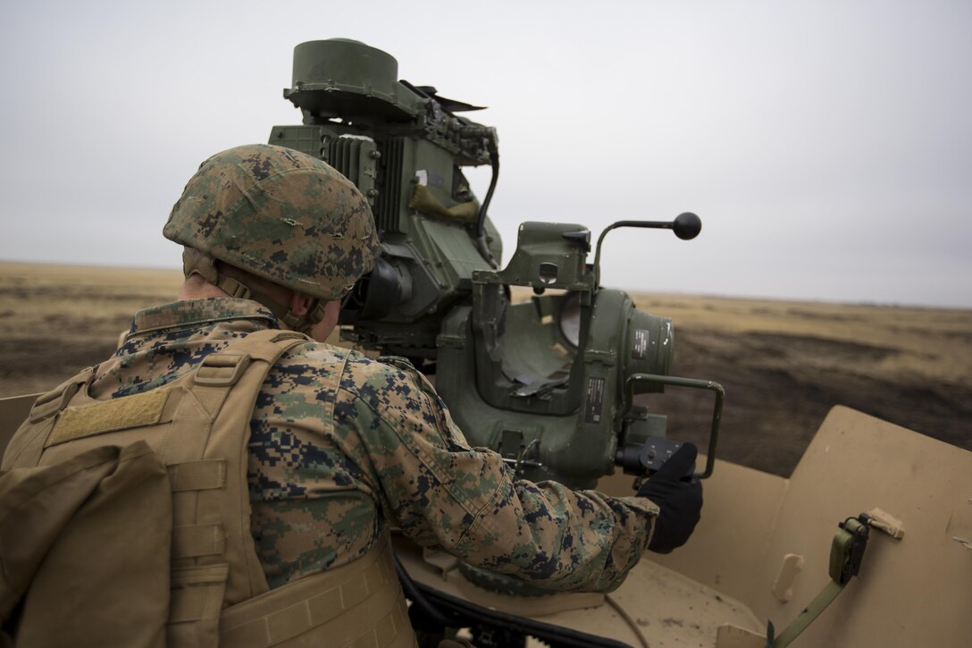 U.S. Marines with Combined Arms Company, Black Sea Rotational Force, prepare to fire a HMMWV-mounted BGM-71 Tube-launched, Optically-tracked, Wire-guided (TOW) anti-tank missile during Platinum Lynx 16-2 at Smardan Training Area, Romania, Dec. 9, 2015. Exercise Platinum Lynx 16-2 is a NATO-led multinational exercise designed to strengthen combat readiness, increase improve collective capabilities, and maintain proven relationships with allied and partner nations. (U.S. Marine Corps photo by Lance Cpl. Melanye E. Martinez/Released)