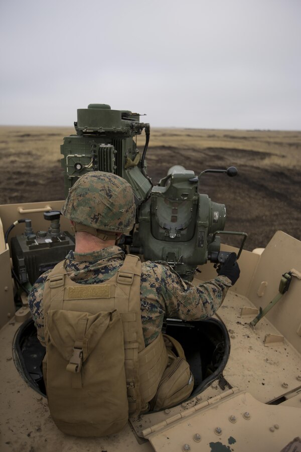 U.S. Marines with Combined Arms Company, Black Sea Rotational Force, prepare to fire a HMMWV-mounted BGM-71 Tube-launched, Optically-tracked, Wire-guided (TOW) anti-tank missile during Platinum Lynx 16-2 at Smardan Training Area, Romania, Dec. 9, 2015. Exercise Platinum Lynx 16-2 is a NATO-led multinational exercise designed to strengthen combat readiness, increase improve collective capabilities, and maintain proven relationships with allied and partner nations. (U.S. Marine Corps photo by Lance Cpl. Melanye E. Martinez/Released)