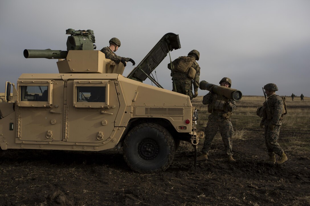 U.S. Marines with Combined Arms Company, Black Sea Rotational Force, prepare to fire a HMMWV-mounted BGM-71 Tube-launched, Optically-tracked, Wire-guided (TOW) anti-tank missile during Platinum Lynx 16-2 at Smardan Training Area, Romania, Dec. 9, 2015. Exercise Platinum Lynx 16-2 is a NATO-led multinational exercise designed to strengthen combat readiness, increase improve collective capabilities, and maintain proven relationships with allied and partner nations. (U.S. Marine Corps photo by Lance Cpl. Melanye E. Martinez/Released)