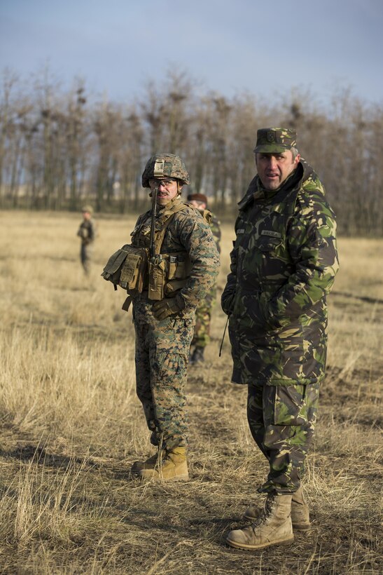 U.S. Marines with Combined Arms Company, Black Sea Rotational Force, conduct field training with Romanian and Moldovan armed forces during Platinum Lynx 16-2 at Smardan Training Area, Romania, Dec. 9, 2015. Exercise Platinum Lynx 16-2 is a NATO-led multinational exercise designed to strengthen combat readiness, increase improve collective capabilities, and maintain proven relationships with allied and partner nations. (U.S. Marine Corps photo by Lance Cpl. Melanye E. Martinez/Released)
