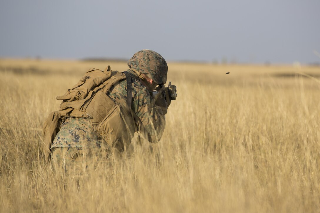 U.S. Marines with Combined Arms Company, Black Sea Rotational Force, conduct field training with Romanian and Moldovan armed forces during Platinum Lynx 16-2 at Smardan Training Area, Romania, Dec. 9, 2015. Exercise Platinum Lynx 16-2 is a NATO-led multinational exercise designed to strengthen combat readiness, increase improve collective capabilities, and maintain proven relationships with allied and partner nations. (U.S. Marine Corps photo by Lance Cpl. Melanye E. Martinez/Released)