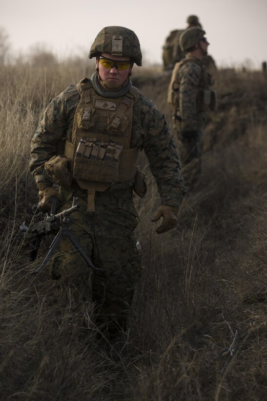 U.S. Marines with Combined Arms Company, Black Sea Rotational Force, conduct field training with Romanian and Moldovan armed forces during Platinum Lynx 16-2 at Smardan Training Area, Romania, Dec. 9, 2015. Exercise Platinum Lynx 16-2 is a NATO-led multinational exercise designed to strengthen combat readiness, increase improve collective capabilities, and maintain proven relationships with allied and partner nations. (U.S. Marine Corps photo by Lance Cpl. Melanye E. Martinez/Released)