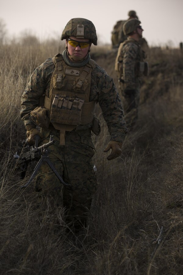 U.S. Marines with Combined Arms Company, Black Sea Rotational Force, conduct field training with Romanian and Moldovan armed forces during Platinum Lynx 16-2 at Smardan Training Area, Romania, Dec. 9, 2015. Exercise Platinum Lynx 16-2 is a NATO-led multinational exercise designed to strengthen combat readiness, increase improve collective capabilities, and maintain proven relationships with allied and partner nations. (U.S. Marine Corps photo by Lance Cpl. Melanye E. Martinez/Released)