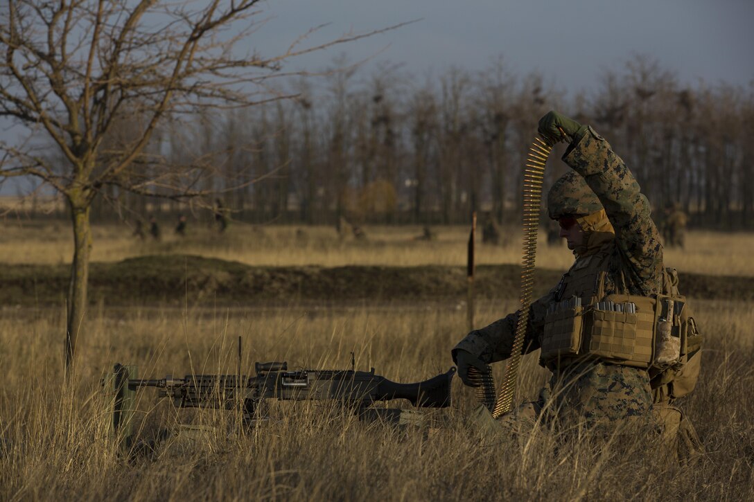 U.S. Marines with Combined Arms Company, Black Sea Rotational Force, conduct field training with Romanian and Moldovan armed forces during Platinum Lynx 16-2 at Smardan Training Area, Romania, Dec. 9, 2015. Exercise Platinum Lynx 16-2 is a NATO-led multinational exercise designed to strengthen combat readiness, increase improve collective capabilities, and maintain proven relationships with allied and partner nations. (U.S. Marine Corps photo by Lance Cpl. Melanye E. Martinez/Released)