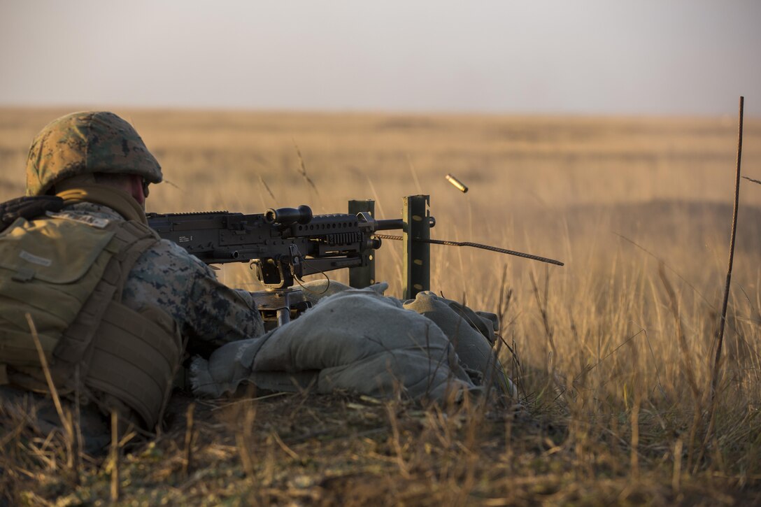 U.S. Marines with Combined Arms Company, Black Sea Rotational Force, conduct field training with Romanian and Moldovan armed forces during Platinum Lynx 16-2 at Smardan Training Area, Romania, Dec. 9, 2015. Exercise Platinum Lynx 16-2 is a NATO-led multinational exercise designed to strengthen combat readiness, increase improve collective capabilities, and maintain proven relationships with allied and partner nations. (U.S. Marine Corps photo by Lance Cpl. Melanye E. Martinez/Released)