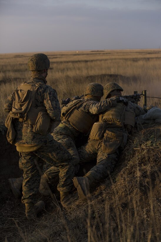 U.S. Marines with Combined Arms Company, Black Sea Rotational Force, conduct field training with Romanian and Moldovan armed forces during Platinum Lynx 16-2 at Smardan Training Area, Romania, Dec. 9, 2015. Exercise Platinum Lynx 16-2 is a NATO-led multinational exercise designed to strengthen combat readiness, increase improve collective capabilities, and maintain proven relationships with allied and partner nations. (U.S. Marine Corps photo by Lance Cpl. Melanye E. Martinez/Released)