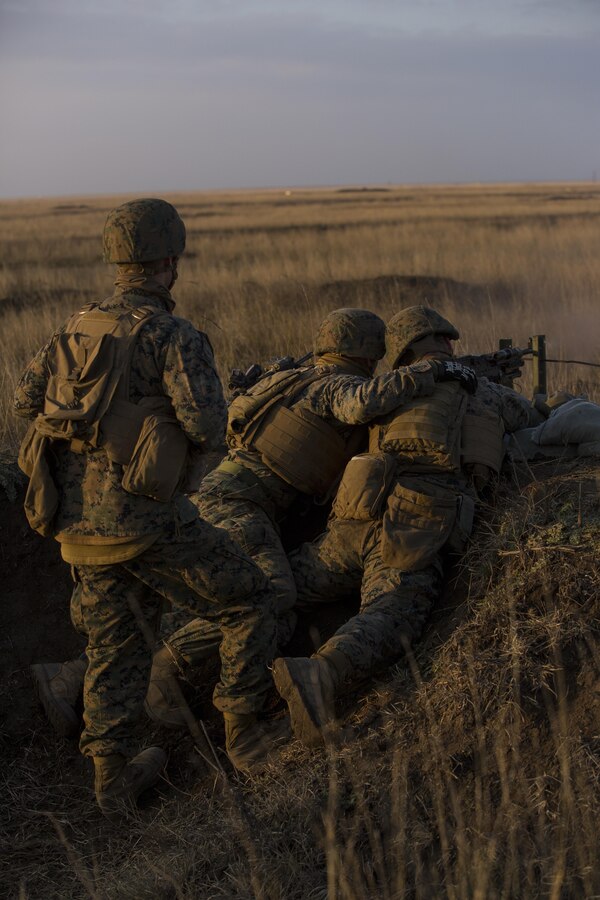 U.S. Marines with Combined Arms Company, Black Sea Rotational Force, conduct field training with Romanian and Moldovan armed forces during Platinum Lynx 16-2 at Smardan Training Area, Romania, Dec. 9, 2015. Exercise Platinum Lynx 16-2 is a NATO-led multinational exercise designed to strengthen combat readiness, increase improve collective capabilities, and maintain proven relationships with allied and partner nations. (U.S. Marine Corps photo by Lance Cpl. Melanye E. Martinez/Released)