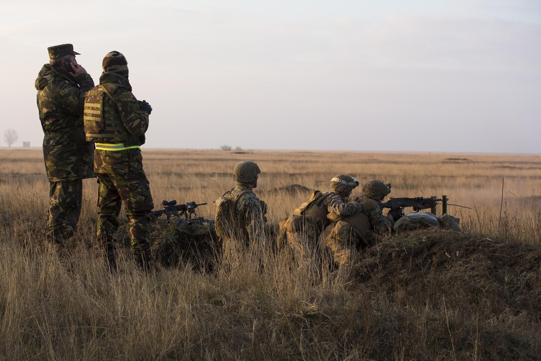 U.S. Marines with Combined Arms Company, Black Sea Rotational Force, conduct field training with Romanian and Moldovan armed forces during Platinum Lynx 16-2 at Smardan Training Area, Romania, Dec. 9, 2015. Exercise Platinum Lynx 16-2 is a NATO-led multinational exercise designed to strengthen combat readiness, increase improve collective capabilities, and maintain proven relationships with allied and partner nations. (U.S. Marine Corps photo by Lance Cpl. Melanye E. Martinez/Released)