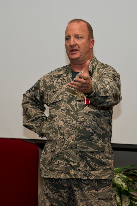 U.S. Air Force Retired Master Sgt. Michael Ward reflects on his military career during his retirement ceremony at Little Rock Air Force Base, Ark., Dec. 11, 2015. Ward retired with 32 years of military service and thanked his family, co-workers and friends for their support and respect throughout his career. (U.S. Air Force photo by Master Sgt. Jeff Walston/Released)     