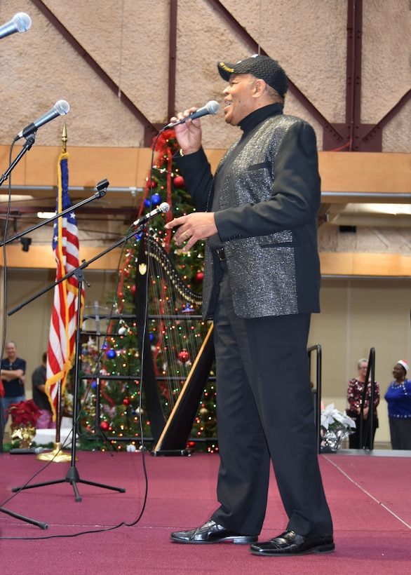 Walter Street, a Defense Logistics Agency  Aviation contractor senior analyst, wins the Holiday Spirit Award for his romantic rendition of “Have Yourself a Merry Little Christmas” during the DLA Aviation Holiday Talent Competition Dec. 10, 2015 in the Frank B. Lotts Conference Center on Defense Supply Center Richmond, Virginia. 
