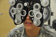 Pvt. Jeanette Lee of the Army Reserve’s 244th Aviation Brigade undergoes vision screening during the mass medical-readiness event hosted Aug. 8-9 by the Army Reserve’s 99th Regional Support Command at Joint Base McGuire-Dix-Lakehurst, N.J., in an effort to increase Soldier readiness throughout the northeastern United States. More than 300 Army Reserve and Army National Guard Soldiers had the opportunity to take care of their Periodic Health Assessments, dental exams, vision screenings, HIV blood draws, immunizations, hearing tests, LOD processing and temporary/permanent profiles during the event.