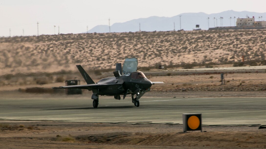 An F-35B Lightning II Joint Strike Fighter, Marine Fighter Attack Squadron 121, 3rd Marine Aircraft Wing, performs a conventional take-off at the Strategic Expeditionary Landing Field during Exercise Steel Knight 2016 at Marine Corps Air Ground Combat Center Twentynine Palms, California, Dec. 11, 2015. This year’s iteration of Exercise Steel Knight works to advance 1st Marine Division’s warfighting capabilities, to include interoperability between the ground and air forces and integration of the F-35B. 