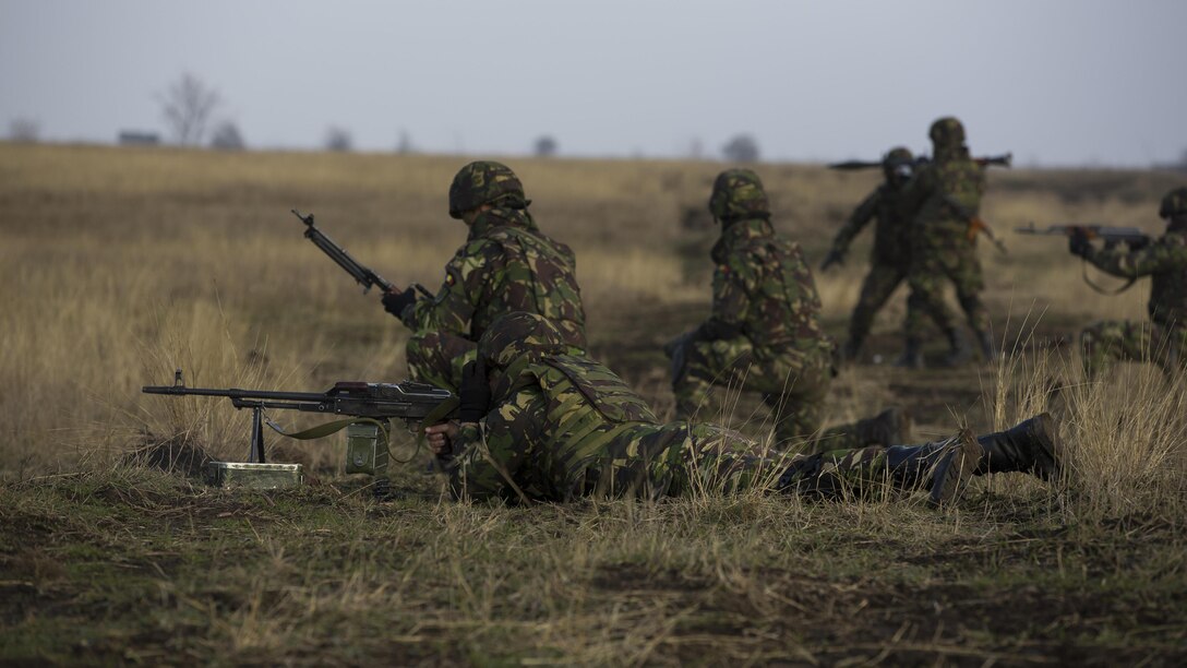 U.S. Marines with Combined Arms Company, Black Sea Rotational Force, conduct field training with Romanian and Moldovan armed forces during Platinum Lynx 16-2 at Smardan Training Area, Romania, Dec. 9, 2015. Exercise Platinum Lynx 16-2 is a NATO-led multinational exercise designed to strengthen combat readiness, increase improve collective capabilities, and maintain proven relationships with allied and partner nations.