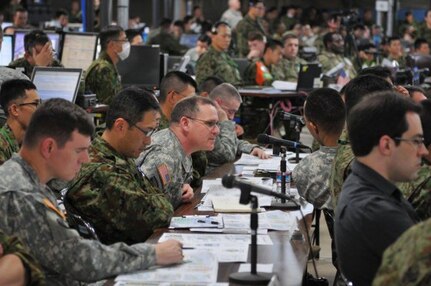 Service members from the Japan Self Defense Force and the United States participate Dec. 8, 2015, in the Yama Sakura 69 exercise at the Middle Army Headquarters in Camp Itami, Japan. More than 5,000 service members participated in the annual bilateral training exercise. 