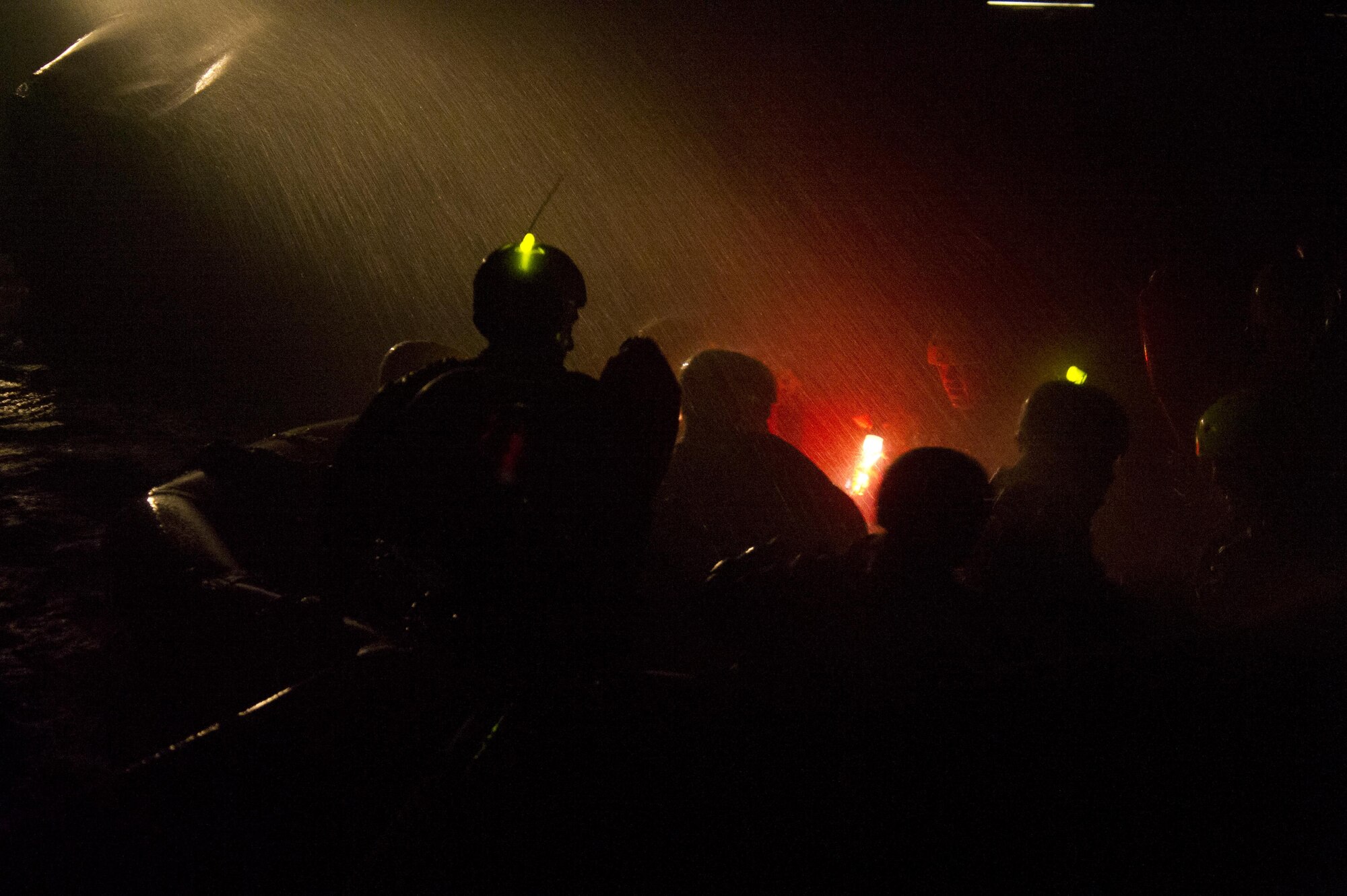Students prepare to assemble their life raft canopy during a water survival scenario Dec. 8, 2015, at Fairchild Air Force Base, Wash. During the two Water Survival courses, students learn a multitude of skills and are put through different scenarios simulating being isolated in open water. (U.S. Air Force photo/Airman 1st Class Nick J. Daniello)