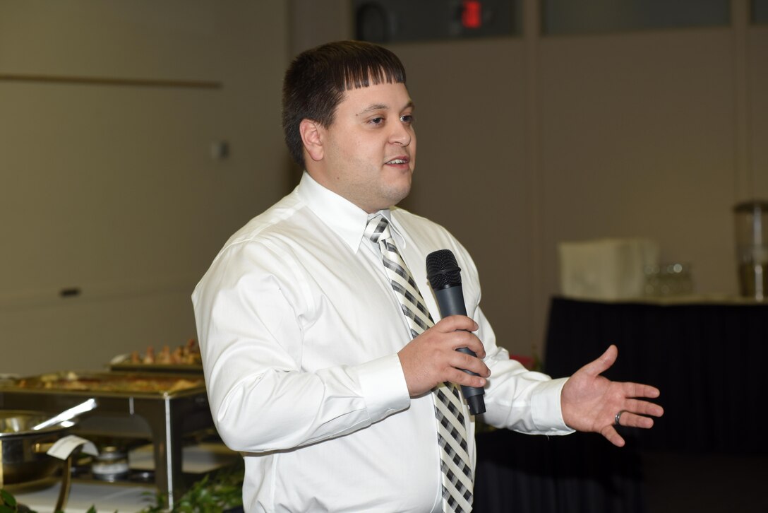 Dustin Russell, electrical engineer in the U.S. Army Corps of Engineers Nashville District Engineering Construction Division’ Engineering and Environmental Services Branch, shares his experiences from the one-year leadership course during the Leadership Development Program graduation Dec. 9, 2015 at the Scarritt Bennett Center in Nashville, Tenn.