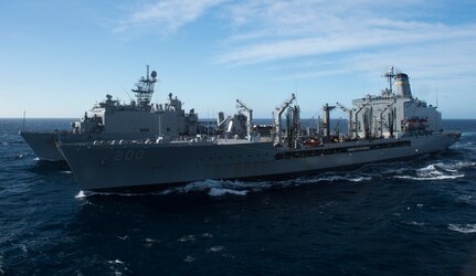 Fleet replenishment oiler USNS Guadalupe (T-AO 200) and dock landing ship USS Harpers Ferry (LSD 49) transit alongside one another during a replenishment at sea. The Boxer Amphibious Ready Group (ARG) is underway off the coast of Southern California completing a certification exercise (CERTEX). CERTEX is the final evaluation of the 13th Marine Expeditionary Unit (13th MEU) and Boxer ARG prior to deployment and is intended to certify their readiness to conduct integrated missions across the full spectrum of military operations. (U.S. Navy photo by Mass Communication Specialist Seaman Craig Z. Rodarte/Released)