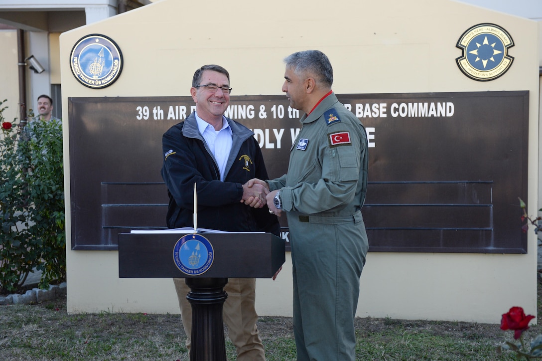 U.S. Defense Secretary Ash Carter and Brig. Gen. Bekir Ercan Van, commander of the 10th Tanker Base Command, shake hands on Incirlik Air Base Turkey, Dec. 15, 2015. DoD photo by U.S. Army Sgt. 1st Class Clydell Kinchen