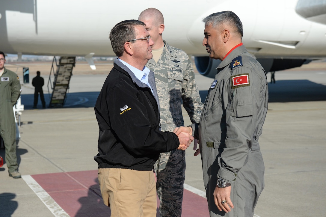 U.S. Defense Secretary Ash Carter shakes hands with Brig. Gen. Bekir Ercan Van, commander of the 10th Tanker Base Command, on Incirlik Air Base, Turkey, Dec.15, 2015. DoD photo by Army Sgt. 1st Class Clydell Kinchen