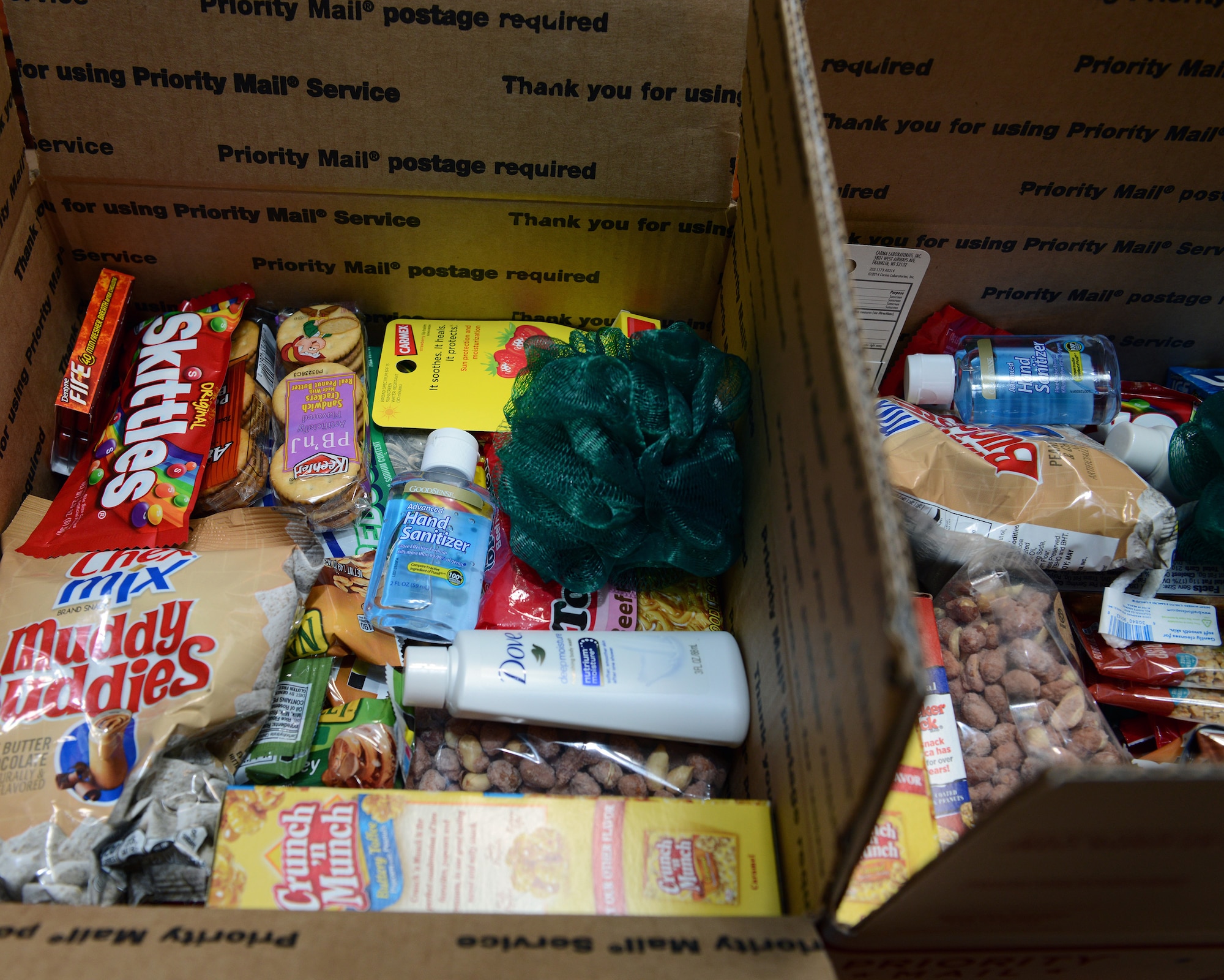 Boxes full of snacks and hygiene items sit at Laughlin Air Force Base, Texas, Dec. 10, 2015. Items were donated at various “drop spots” on base, before being collected, packed and shipped to Laughlin’s deployed members. (U.S. Air Force photo by Senior Airman Jimmie D. Pike)