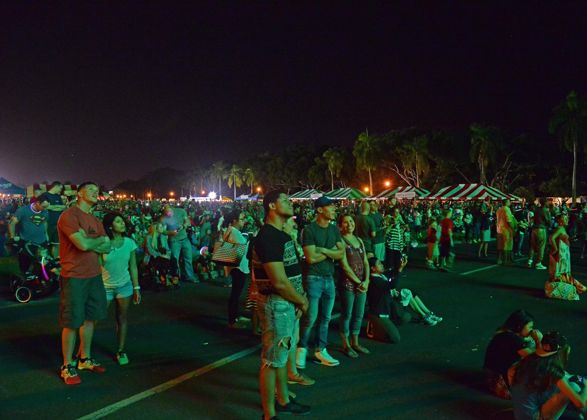 Nearly 4,000 service members and their families attended the 46th Annual Freedom Tower Lighting celebration on Joint Base Pearl Harbor-Hickam, Hawaii, Dec. 11, 2015. Over 5,000 lights illuminate the 178-foot Freedom Tower . (U.S. Air Force photo by Tech. Sgt. Aaron Oelrich/Released)
