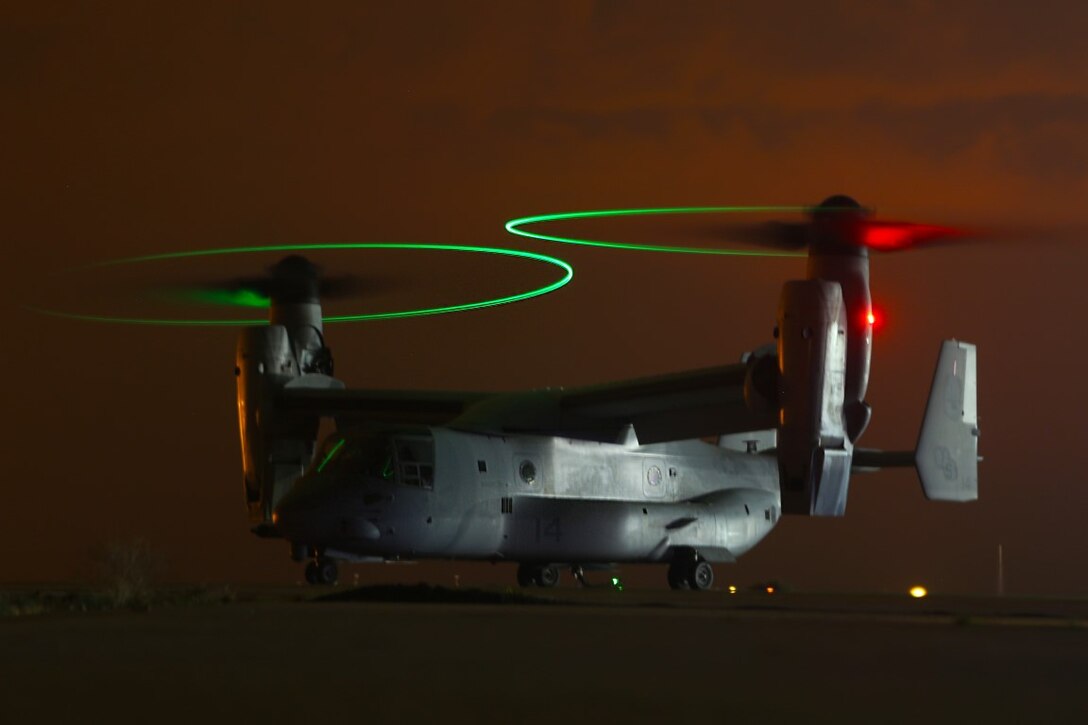 A MV-22B Osprey with Marine Medium Tiltrotor Squadron 268 prepares to take off in order to perform external load qualifications at an undisclosed location in Southwest Asia, Dec.13, 2015. The qualification extends the squadrons expeditionary capabilities in support of Special Purpose Marine Air Ground Task Force Crisis Response-Central Command. (Marine Corps photo by Sgt. Owen Kimbrel/RELEASED)