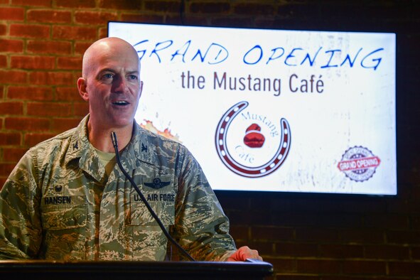 Col. Andrew Hansen, 51st Fighter Wing commander, speaks during the Mustang Café grand opening at Osan Air Base, Republic of Korea, Dec. 15, 2015. Hansen thanked everyone who contributed to the Café’s opening and discussed future renovations to the building. (U.S. Air Force photo/Airman 1st Class Dillian Bamman)