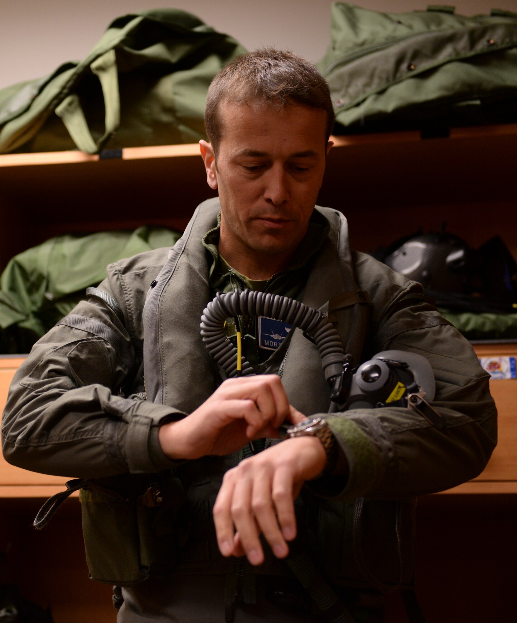 Norwegian Maj. Morten Hanche, 62nd Fighter Squadron F-35 student pilot, suits up for his historic flight of one of two Norwegian F-35s, Dec. 14, 2015, at Luke Air Force Base. Maj. Hanche is the first Norwegian to ever pilot an F-35. (U.S. Air Force photo by Airman 1st Class Ridge Shan)