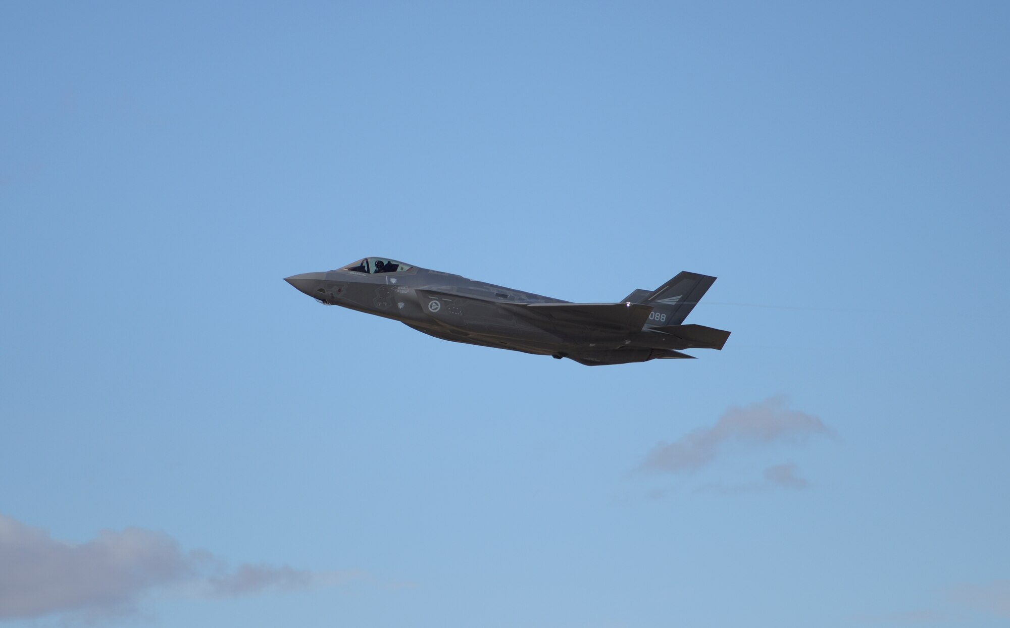 One of the first two Norwegian F-35s soars through the air under the control of Norwegian Maj. Morten Hanche, 62nd Fighter Squadron F-35 student pilot, Dec. 14, 2015, at Luke Air Force Base. Hanche engaged in simulated close air support in coordination with ground forces as an exercise during the sortie. (U.S. Air Force photo by Airman 1st Class Ridge Shan)