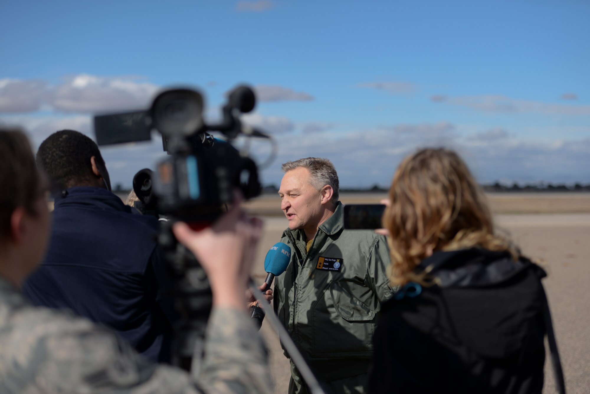 Maj. Gen. Per-Egil Rygg, Chief of Staff of the Royal Norwegian Air Force, conducts an interview for members of the press, Dec. 14, 2015, at Luke Air Force Base. Rygg discussed the significance of the first flight of a Norwegian F-35 by a Norwegian pilot, Maj. Morten Hanche. (U.S. Air Force photo by Airman 1st Class Ridge Shan)