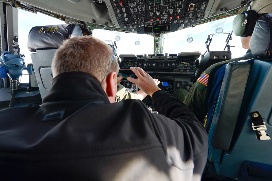 The 2015 Dover Air Force Base Honorary Commanders during a tour of the 436th Operations Group Nov. 23, 2015, on Dover Air Force Base, Del. and airborne aboard a C-17A Globemaster III. (U.S. Air Force photo/Greg L. Davis)