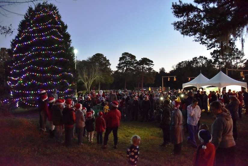 Carolers sang holiday songs during the annual Christmas tree lighting ceremony at Joint Base Charleston - AB on Dec. 8, 2015 in Charleston, S.C. Hot chocolate was served and Santa came to visit with the children. (photo by Jessica Donnelly/JB Charleston FSS)