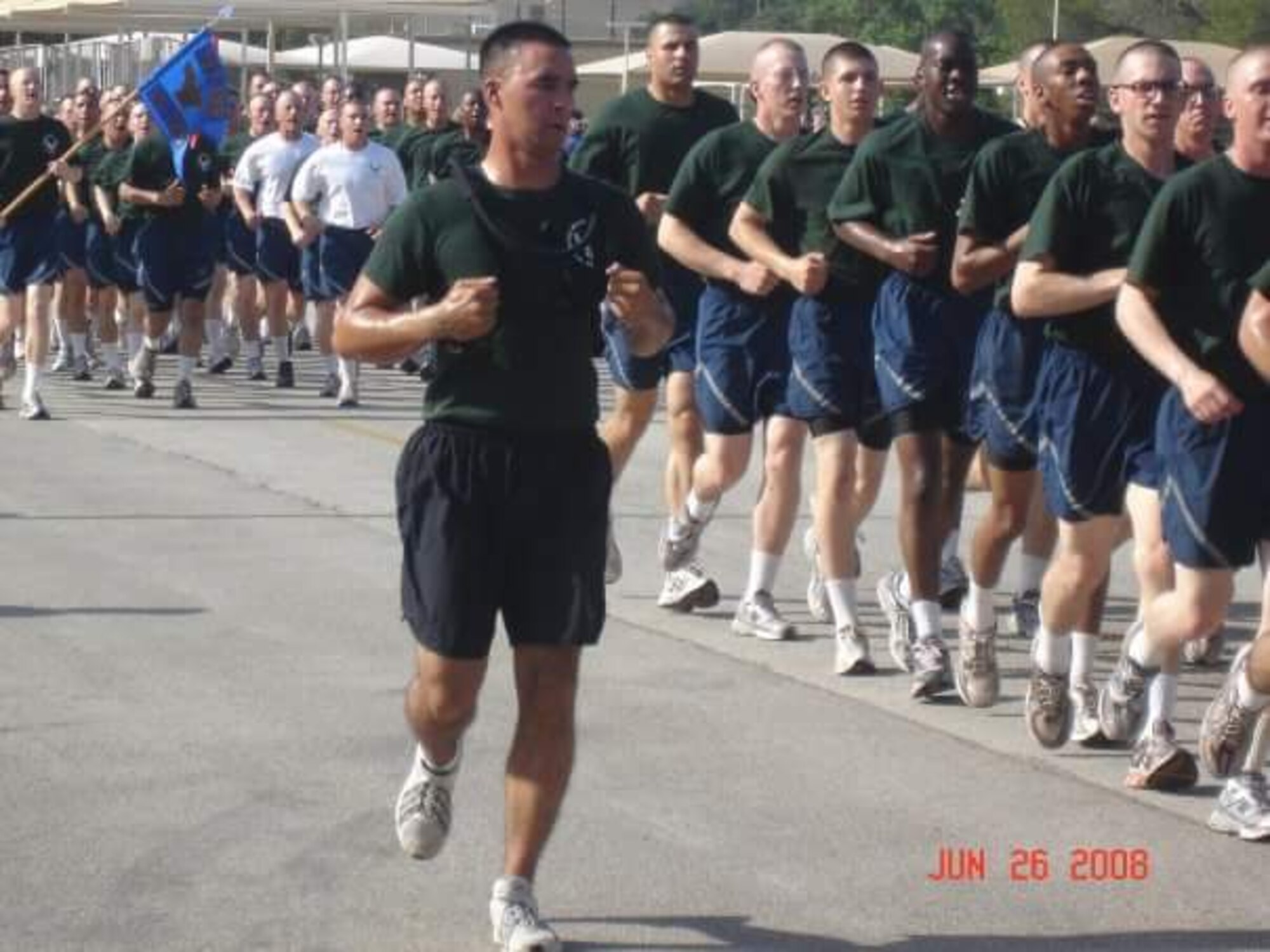 LACKLAND AIR FORCE BASE, Texas – Then Staff Sgt. Jeremy Lawson, 323rd Training Squadron military training instructor, leads a flight during a formation run at basic military training. Lawson was an MTI for the 323rd TS for four years and is now a Tech. Sgt. at Peterson Air Force Base with the 21st Civil Engineer Squadron. (Courtesy photo)