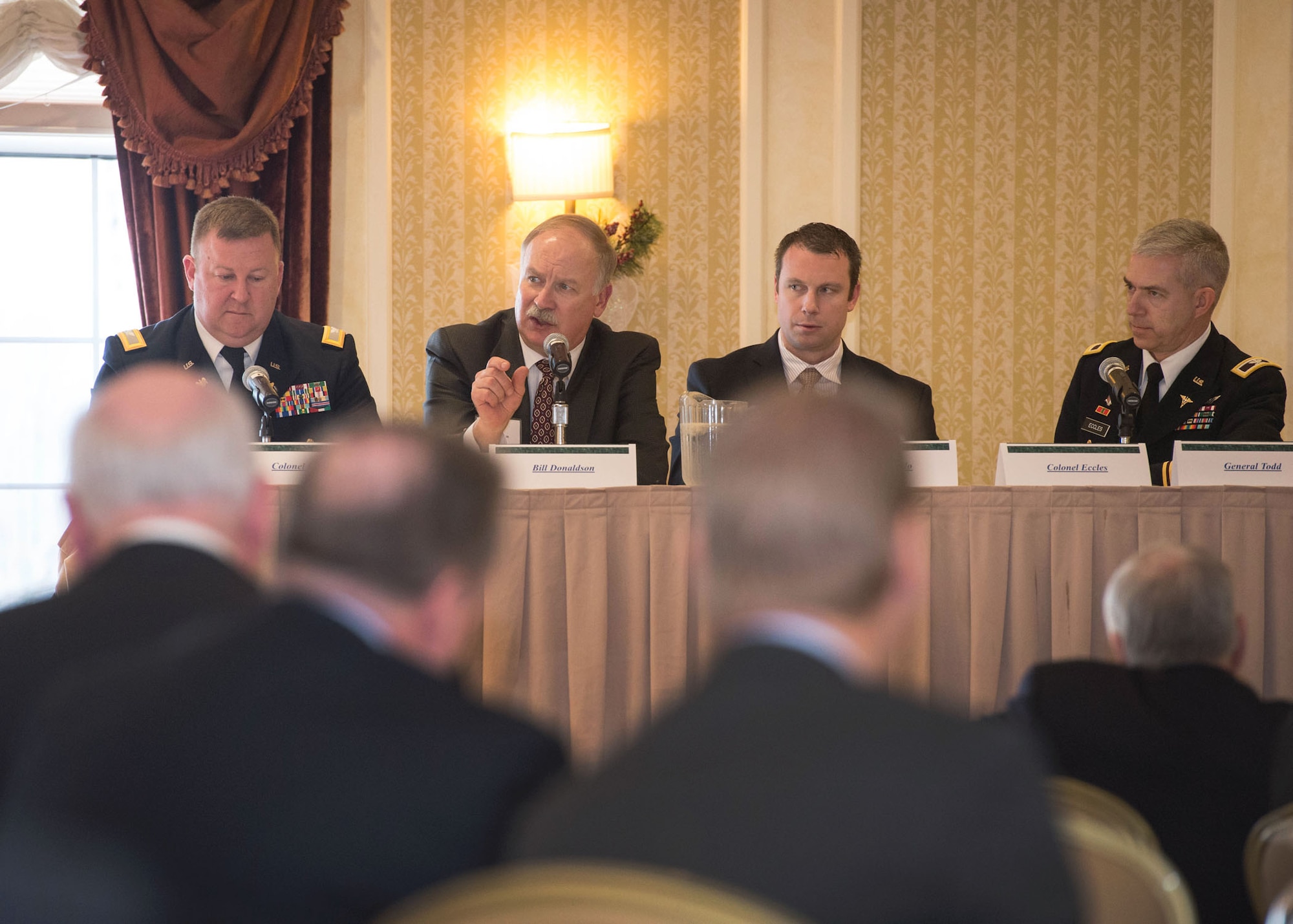 DEVENS, Mass. -- Bill Donaldson, Hanscom Small Business director, answers a question during a panel discussion at the Massachusetts Military Asset and Security Strategy Task Force Small Business Forum at the Devens Conference Center Dec. 11. The Military Task Force hosted the event in partnership with MassDevelopment, the state's finance and development agency. Representatives from Hanscom Air Force Base, Mass., Natick Soldier Systems, Mass., the Massachusetts National Guard and businesses leaders participated in the event. (U.S. Air Force photo by Jerry Saslav)