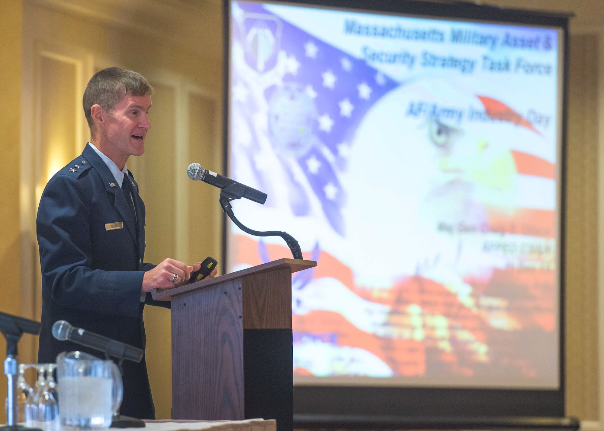DEVENS, Mass. -- Maj. Gen. Craig Olson, C3I and Networks Directorate program executive officer, discusses contracting opportunities available within his directorate to small businesses during a small business forum at the Devens Conference Center Dec. 11. The Massachusetts Military Asset and Security Strategy Task Force on Friday hosted a forum during which representatives from Hanscom Air Force Base, Mass., Natick Soldier Systems, Mass., the Massachusetts National Guard, and businesses leaders discussed how to work more closely with the U.S. Air Force, Army and National Guard. Olson and numerous military officials spoke about upcoming opportunities and the importance of the Commonwealth’s military installations to Massachusetts and the nation. The forum comes ahead of a Dec. 18 event at Westover Air Reserve Base, Mass., in which officials will unveil two new economic studies of the defense sector’s impact. (U.S. Air Force photo by Jerry Saslav)