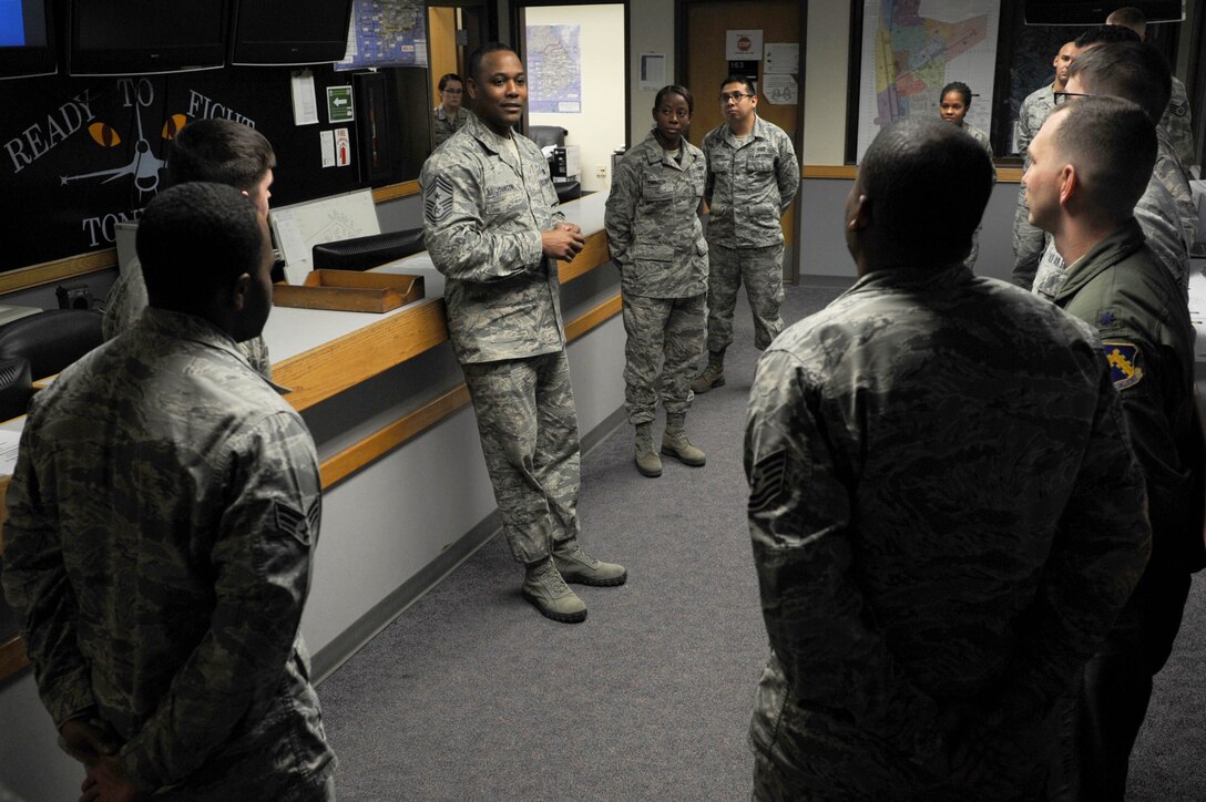 Chief Master Sgt. Anthony Johnson, Seventh Air Force command chief, speaks to Wolf Pack members during his immersion tour at Kunsan Air Base, Republic of Korea, Dec. 3, 2015. The experience was designed to give the command chief a first-hand look at the 8th Fighter Wing mission. (U.S. Air Force photo by Senior Airman Ashley L. Gardner/Released)