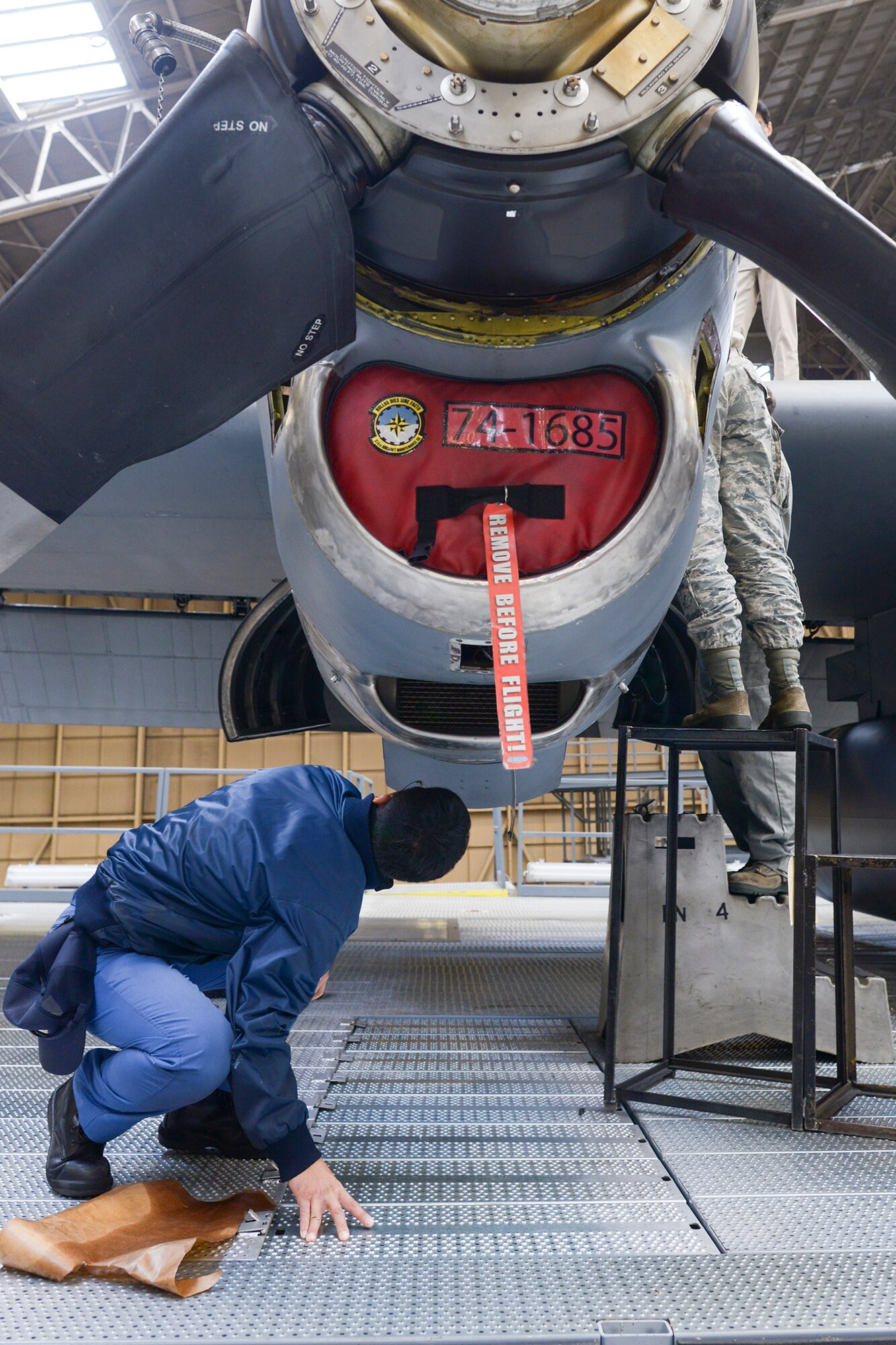 Japan Maritime Self-Defense Force Petty Officer 2nd Class Takeshi Murai, 4
Maintenance Squadron, inspects a C-130 Hercules engine during a facility tour at
Yokota Air Base, Japan, Dec. 11, 2015. The JMSDF maintainers compared the
maintenance conducted at Yokota to their own to help improve processes and
efficiency. (U.S. Air Force photo by Staff Sgt. Cody H. Ramirez/Released)