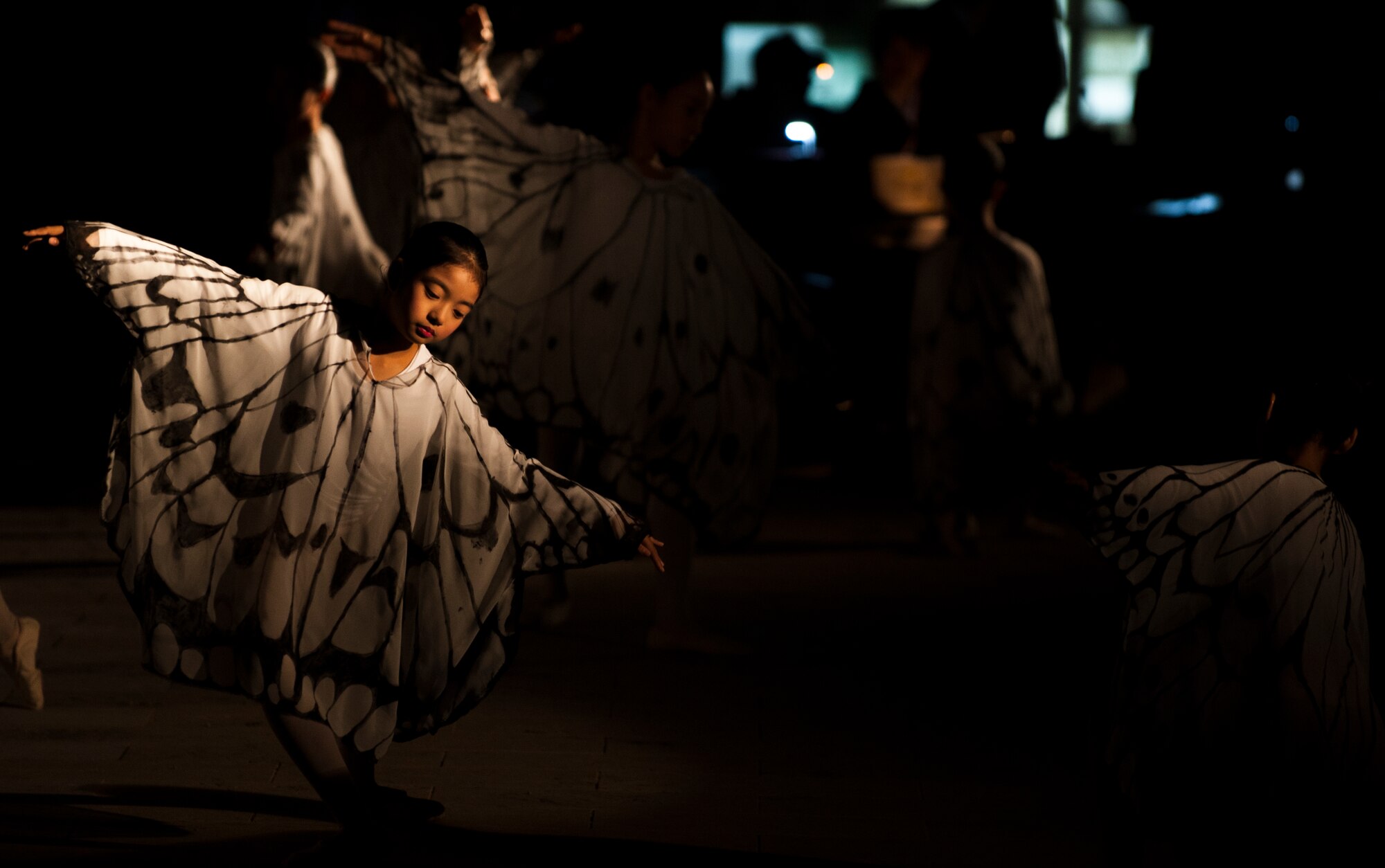 Okinawan children perform a dance during the Okinawan Heart of Peace festival, Dec. 12, 2015, at the Okinawan Prefectural Peace Park, Okinawa, Japan. The Heart of Peace festival is held in honor of the lives lost during the Pacific War. (U.S. Air Force photo by Airman 1st Class Nicholas Emerick)