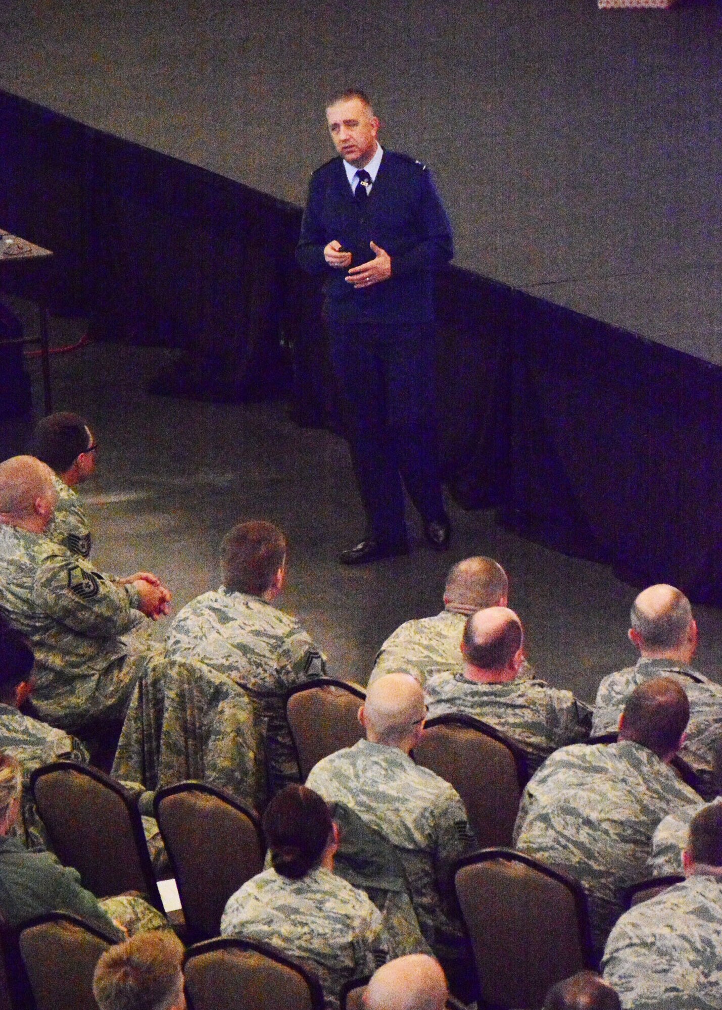 Individual Mobility Augmentee to the Director of the Profession of Arms Center of Excellence (PACE), Col. Richard Tatem, speaks to 120th Airlift Wing Airmen during the Wingman Day event held at the Mansfield Convention Center in Great Falls, Mont., on Dec. 5, 2015. (U.S. Air National Guard photo by Senior Master Sgt. Eric Peterson/Released)