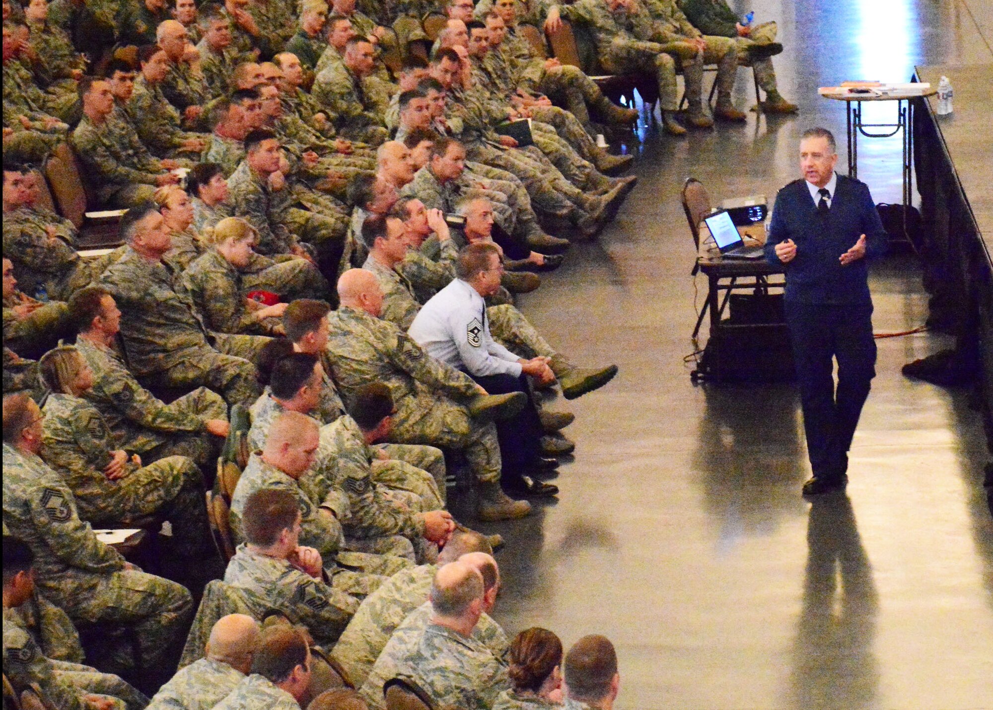 Individual Mobility Augmentee to the Director of the Profession of Arms Center of Excellence (PACE), Col. Richard Tatem, speaks to 120th Airlift Wing Airmen during the Wingman Day event held at the Mansfield Convention Center in Great Falls, Mont., on Dec. 5, 2015. (U.S. Air National Guard photo by Senior Master Sgt. Eric Peterson/Released)