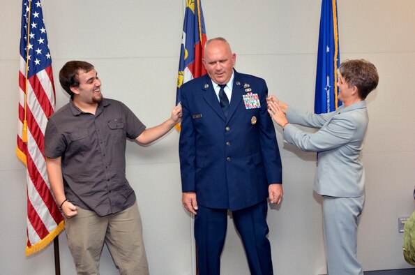 U. S. Air Force Senior Master Sgt. Randall L. Jones, 145th Civil Engineer Squadron, was promoted to the highest enlisted rank of chief master sergeant during a ceremony held in his honor at the North Carolina Air National Guard Base, Charlotte Douglas International Airport, Nov. 7, 2015. As part of the promotion ceremony, commanders, current and retired Airmen and family members were given the privilege of participating in the longstanding Air Force tradition of “tacking on” chief chevrons onto Jones’ uniform. Chief Master Sergeant is the ninth and highest enlisted rank in the Air Force, an achievement that only one percent of enlisted Airmen attain. Chief Jones enlisted in the military in 1988 and has been a member of the North Carolina Air National Guard since 1990. (U.S. Air National Guard photo by Master Sgt. Patricia F. Moran, 145th Public Affairs/Released)

