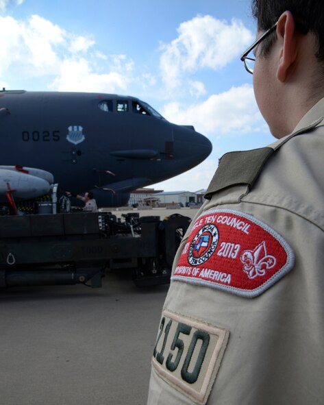 A Boy Scout looks at a B-52 Stratofortress during Warrior Huddle at Barksdale Air Force Base, La., Dec. 11, 2015. The scouts toured the base and visited units to include the parachute shop, dormitory, emergency management and wood shop. (U.S. Air Force photo/Senior Airman Jannelle Dickey)
