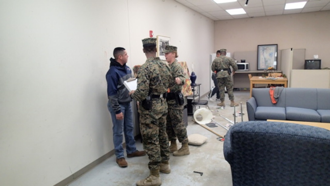 Students from Military Police Officer Basic Course conducting law enforcement operations. 