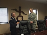 DLA Energy Commander Air Force Brig. Gen. Mark McLeod, right, meets Service des Essences des Armées Commanding General Maj. Gen. Jean-Luc Volpi at Fort Lee, Virginia, Dec. 9. 