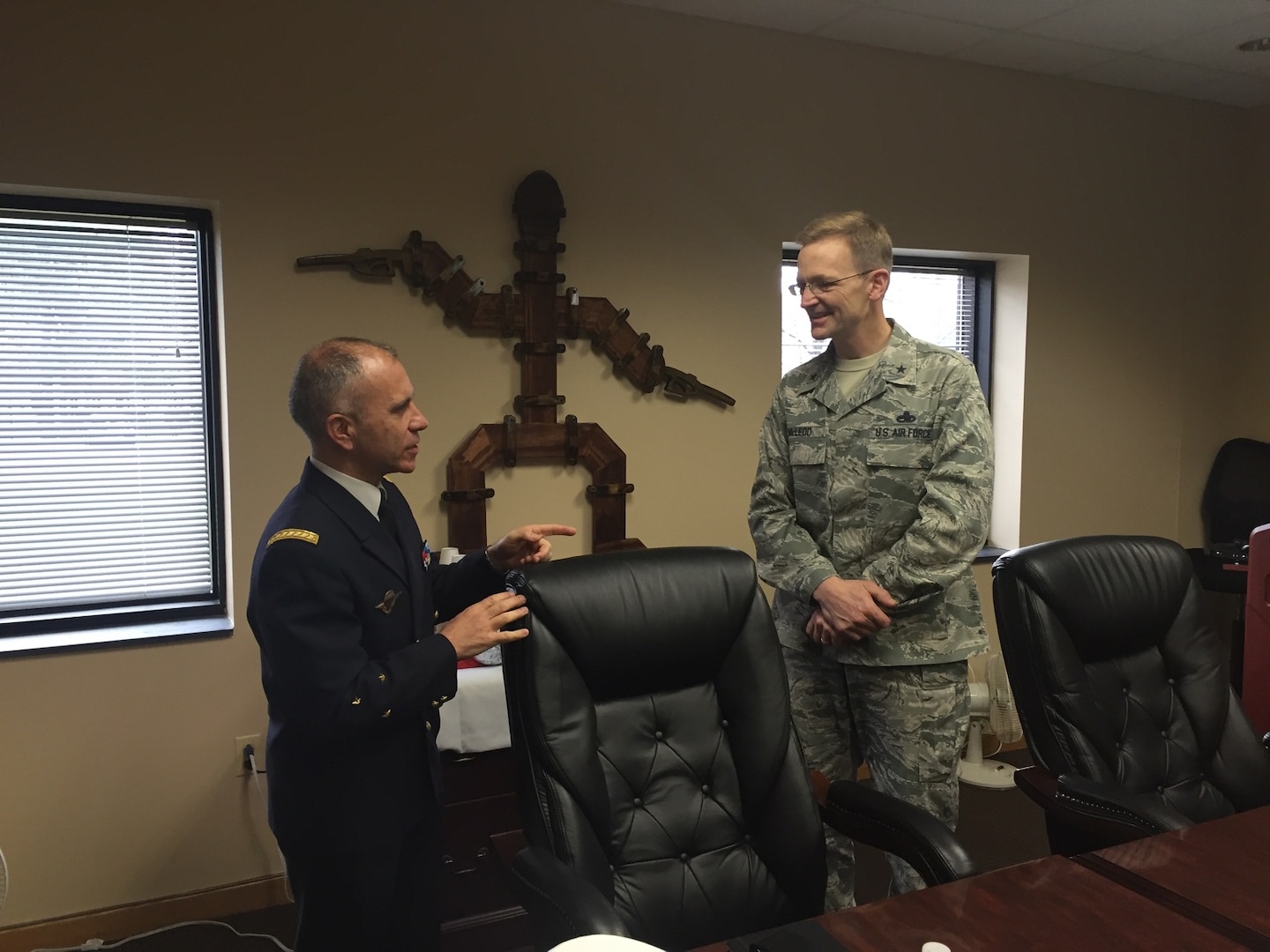 DLA Energy Commander Air Force Brig. Gen. Mark McLeod, right, meets Service des Essences des Armées Commanding General Maj. Gen. Jean-Luc Volpi at Fort Lee, Virginia, Dec. 9. 