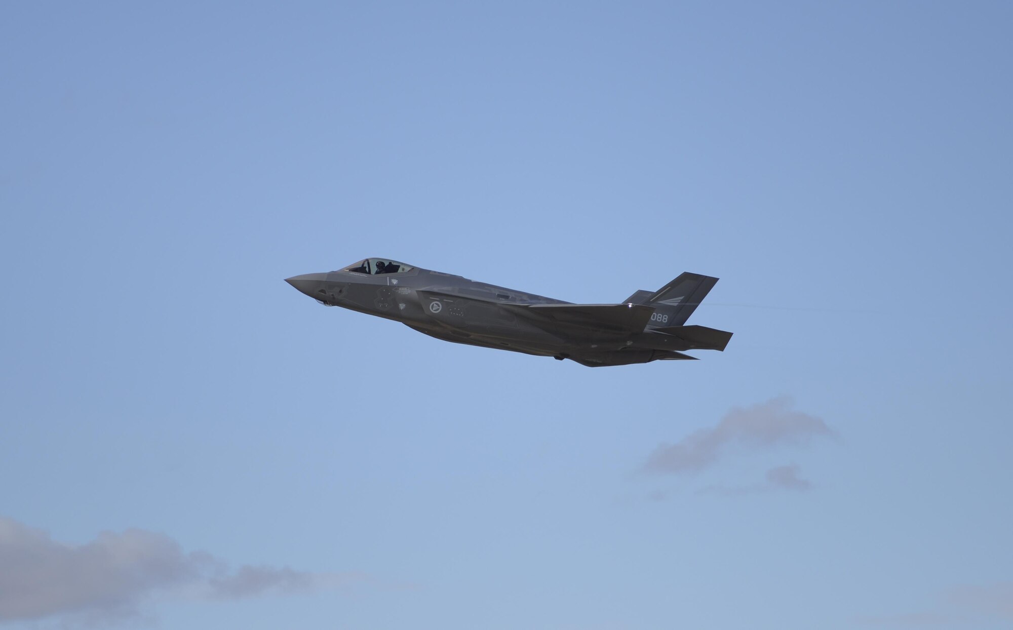 One of the first two Norwegian F-35s soars through the air under the control of Norwegian Maj. Morten Hanche, 62nd Fighter Squadron F-35 student pilot, Dec. 14, 2015, at Luke Air Force Base. Hanche engaged in simulated close air support in coordination with ground forces as an exercise during the sortie. (U.S. Air Force photo by Airman 1st Class Ridge Shan)